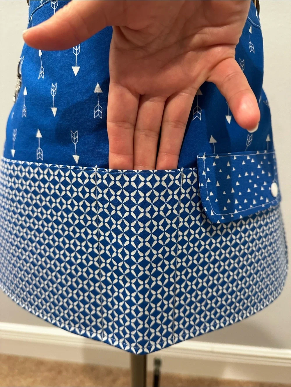 Blue Patterned Apron with Pockets across the front and a Snap Pocket